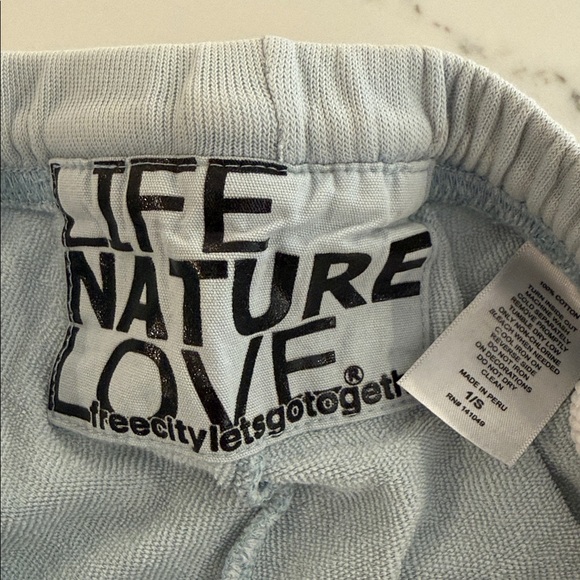 FreeCity Light Blue Sweatpants with Black Print - Picture 4 of 4